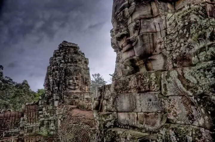 Giant smiling stone faces at Bayon Temple, Angkor Thom 